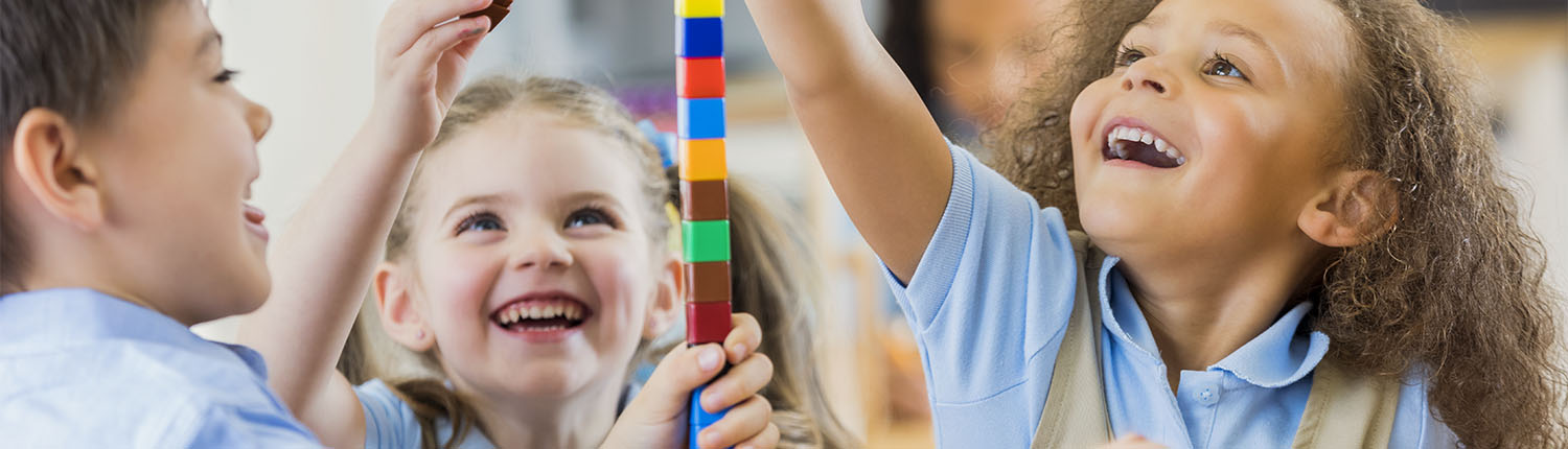 Private school students playing with blocks